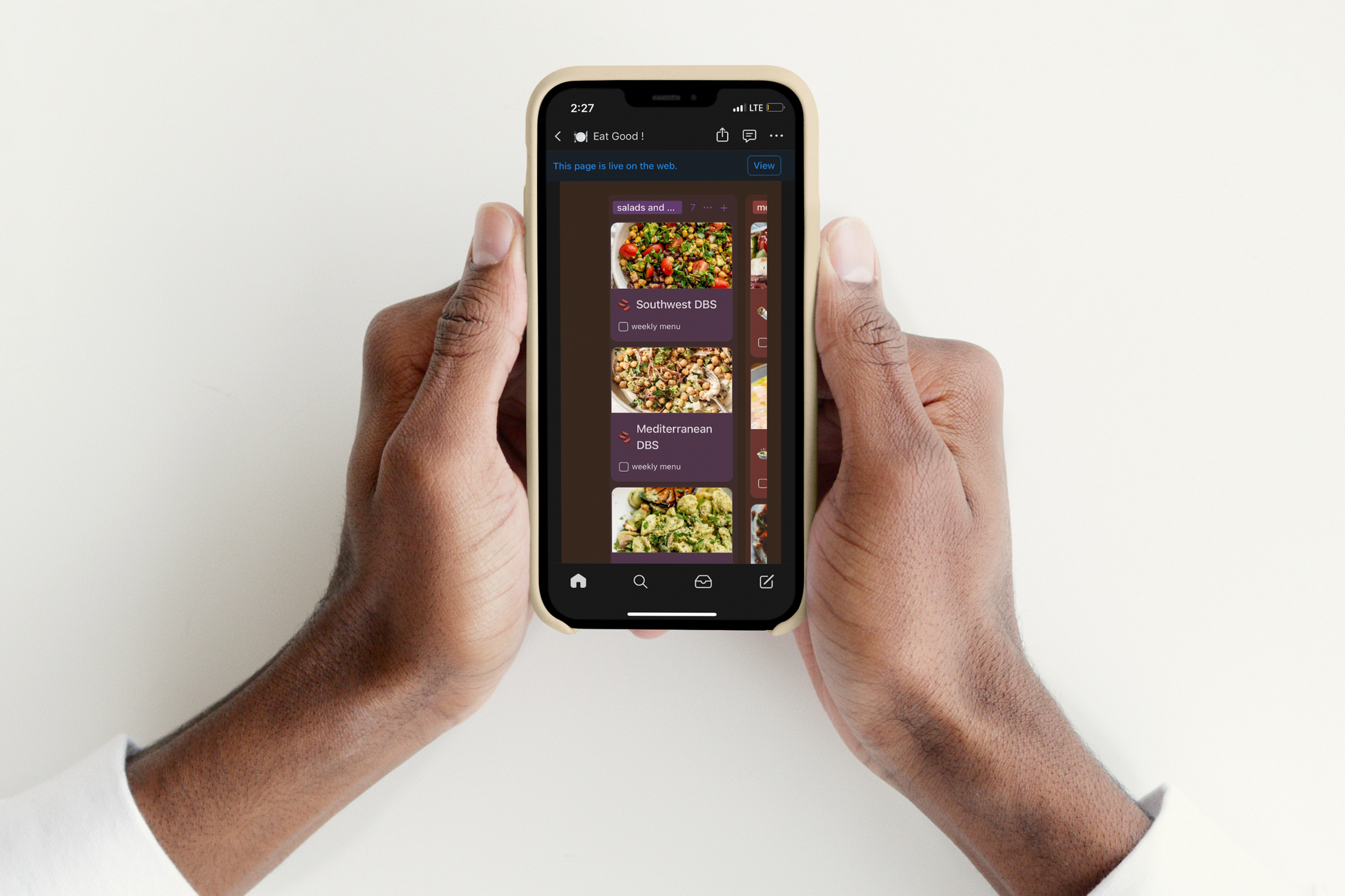 Person looks at menu items on Notion Menu and Grocery Planning Tool on mobile